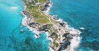 an aerial view of an island in the ocean