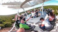 a group of people riding in a hot air balloon